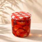 Vela artesanal Mermelada de Mandarina de Casa Calma en tarro de cristal con tapa de cuadros rojos, vista frontal
