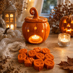Vista del quemador de calabaza naranja encendido con wax melts naranjas de Casa Calma