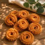 Wax melts de tarta de manzana y canela de Casa Calma, de color naranja y forma circular con bordes ondulados